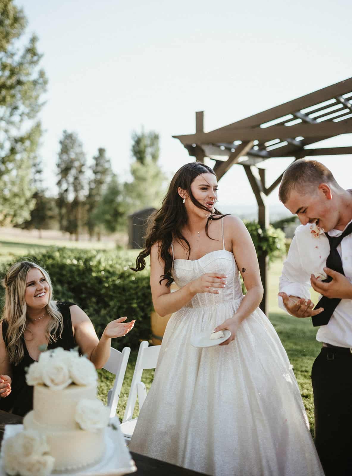 Hannah, a photographer, hanging up a wedding dress